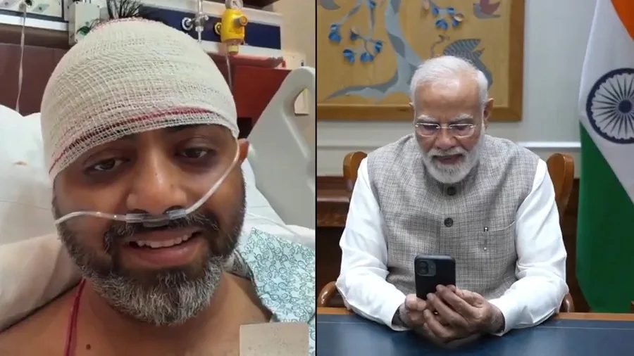 Piloto indio Smit Machchhar con vendajes en videollamada con el primer ministro Narendra Modi desde hospital en Abu Dabi