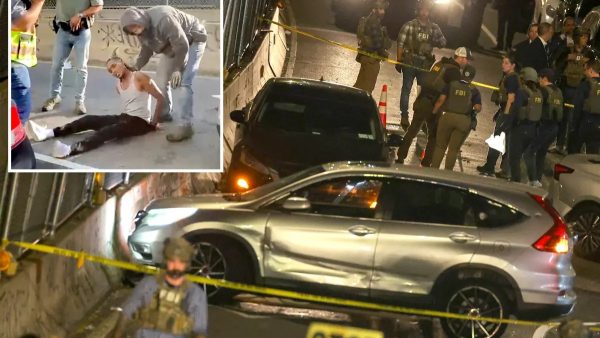 Agentes del ICE durante un operativo en Nueva York con chalecos antibalas y credenciales visibles
